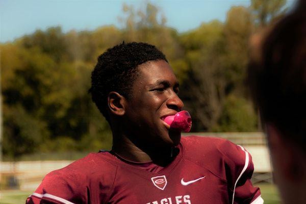 Youth athlete wearing a sports mouthguard during training