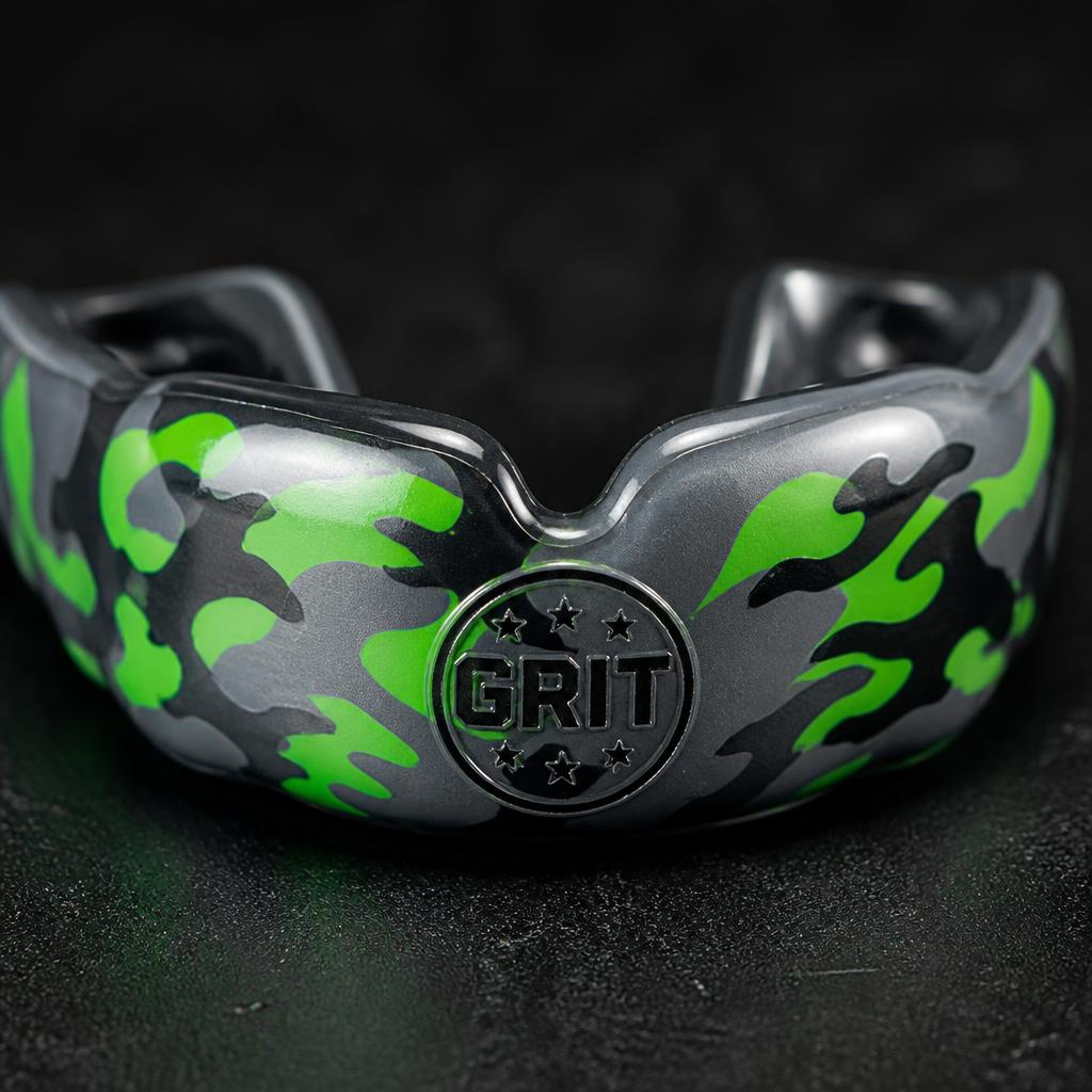 Custom gunmetal and neon green camo team mouthguard with GRIT crest